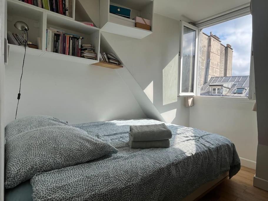 Cosy Sur La Festive Rue Du Fbg Saint-denis Apartment *